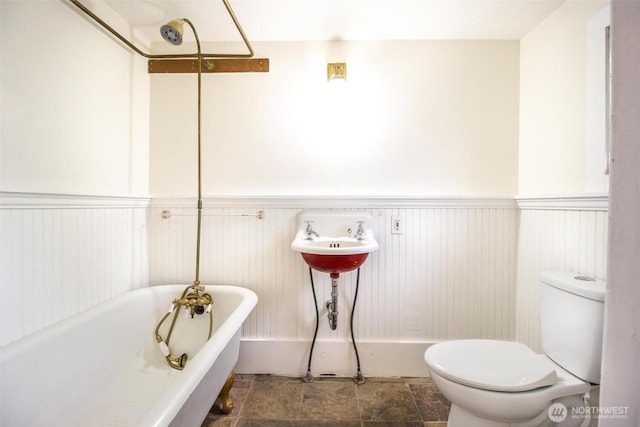 835 J St, Port Townsend, WA 98368 - full bathroom featuring a wainscoted wall and a soaking tub