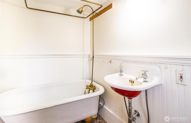 835 J St, Port Townsend, WA 98368 - bathroom with a freestanding tub and a wainscoted wall