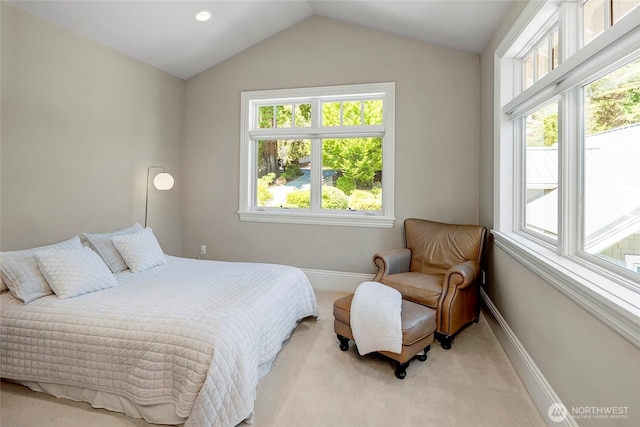 8066 Avalon Pl, Mercer Island, WA 98040 - bedroom with multiple windows, light carpet, and vaulted ceiling