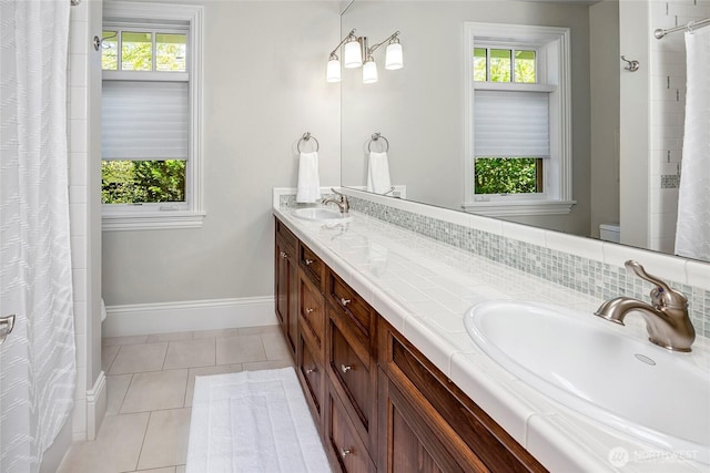 8066 Avalon Pl, Mercer Island, WA 98040 - bathroom with double vanity, tile patterned flooring, and a shower with curtain