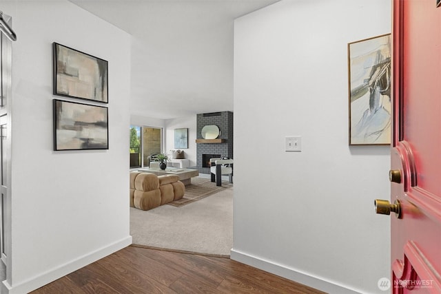 4545 Sand Point Way NE Unit 806, Seattle, WA 98105 - hall with baseboards and wood finished floors