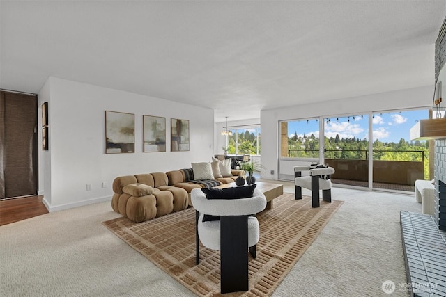 4545 Sand Point Way NE Unit 806, Seattle, WA 98105 - living area with carpet floors and a brick fireplace