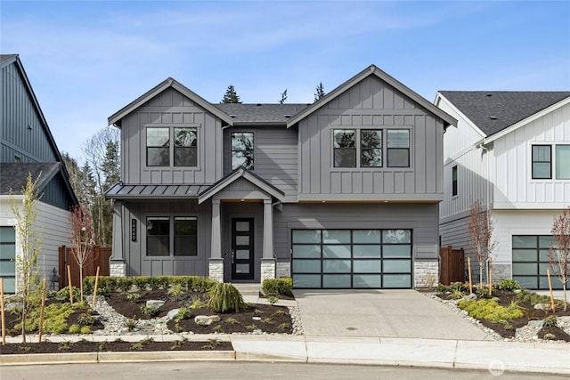 14449 133rd Pl NE, Woodinville, WA 98072 - modern farmhouse style home with board and batten siding, stone siding, a garage, driveway, and a standing seam roof