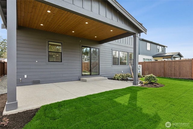 14449 133rd Pl NE, Woodinville, WA 98072 - back of property with board and batten siding and a patio area