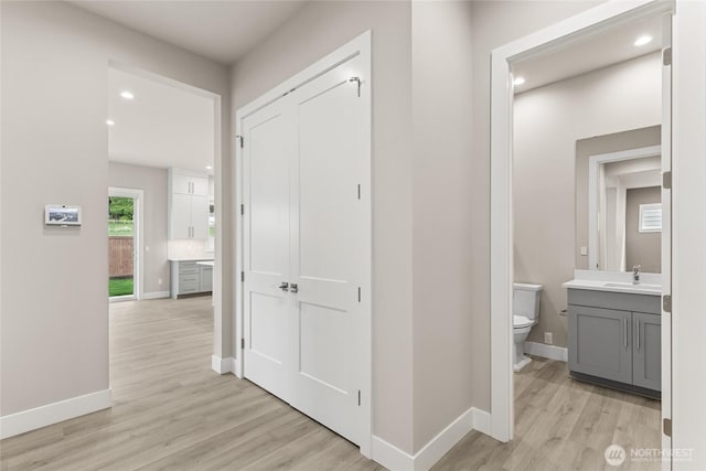 14449 133rd Pl NE, Woodinville, WA 98072 - corridor featuring light wood finished floors and recessed lighting