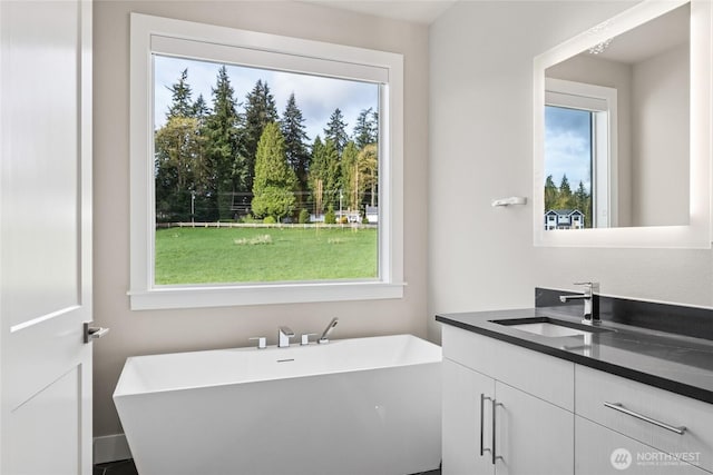 14449 133rd Pl NE, Woodinville, WA 98072 - bathroom featuring vanity and a freestanding bath