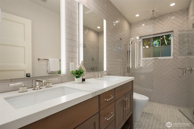 2665 Evergreen Point Rd NE, Medina, WA 98039 - bathroom featuring double vanity, a stall shower, recessed lighting, and tile patterned flooring