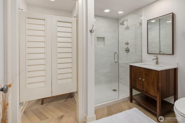 2665 Evergreen Point Rd NE, Medina, WA 98039 - bathroom featuring a stall shower, vanity, and recessed lighting