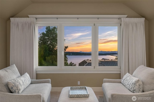 2665 Evergreen Point Rd NE, Medina, WA 98039 - sitting room featuring lofted ceiling, carpet floors, and a water view