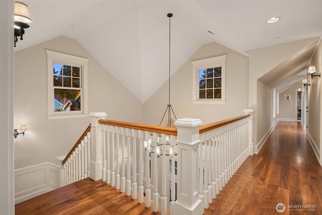 2665 Evergreen Point Rd NE, Medina, WA 98039 - stairs with wood finished floors, lofted ceiling, and a wainscoted wall