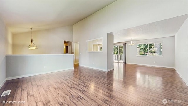 33700 33rd Pl SW, Federal Way, WA 98023 - unfurnished living room with vaulted ceiling and wood finished floors