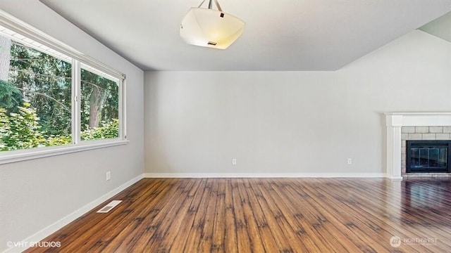 33700 33rd Pl SW, Federal Way, WA 98023 - unfurnished living room featuring hardwood / wood-style flooring and a fireplace