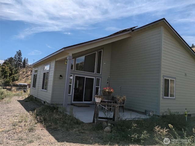 957 Twisp Carlton Rd Unit D, Twisp, WA 98856 - back of property with a patio