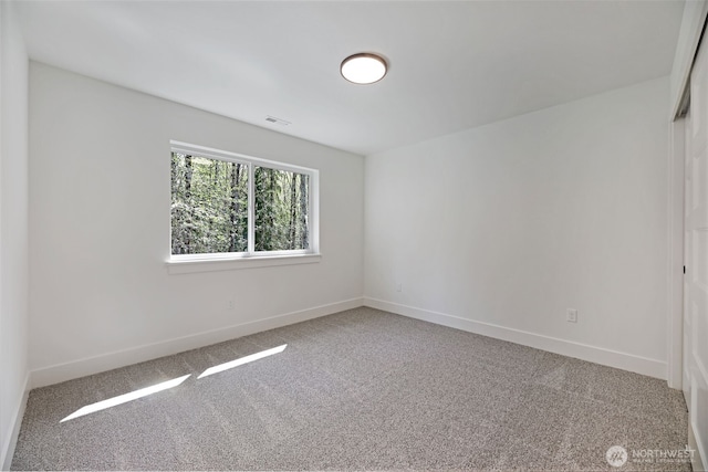 16806 62nd St SE, Snohomish, WA 98290 - carpeted spare room featuring baseboards