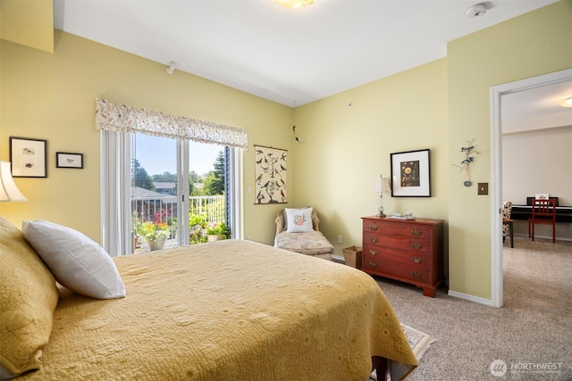 516 Darby Dr Unit 207, Bellingham, WA 98226 - bedroom with light colored carpet and access to exterior