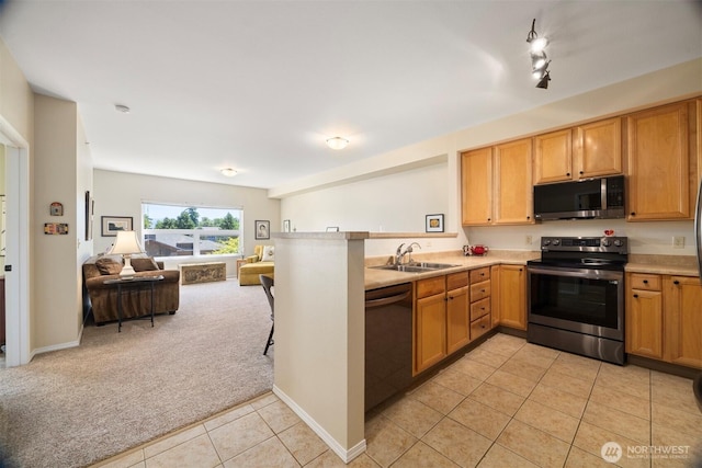 516 Darby Dr Unit 207, Bellingham, WA 98226 - kitchen featuring open floor plan, light carpet, stainless steel range with electric stovetop, light tile patterned floors, and dishwashing machine
