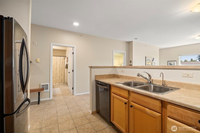 516 Darby Dr Unit 207, Bellingham, WA 98226 - kitchen featuring appliances with stainless steel finishes, light countertops, light tile patterned floors, and recessed lighting
