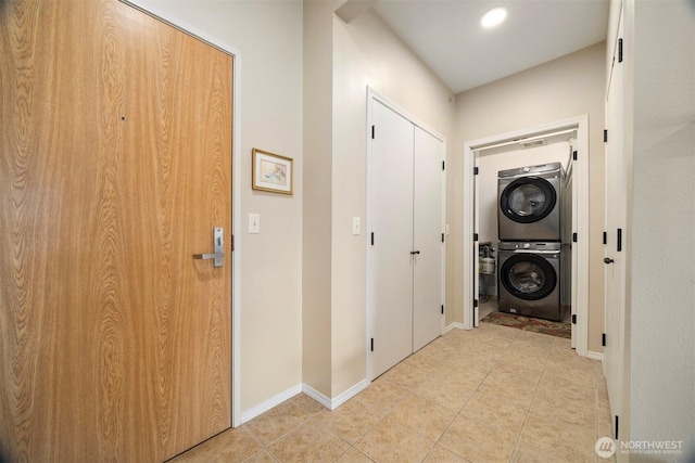 516 Darby Dr Unit 207, Bellingham, WA 98226 - laundry room with estacked washer and dryer and light tile patterned floors