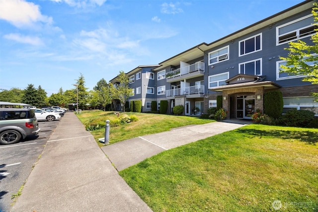 516 Darby Dr Unit 207, Bellingham, WA 98226 - view of apartment building / complex with uncovered parking