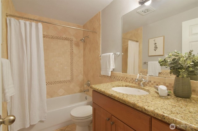 13021 SE 38th St Unit J8, Bellevue, WA 98006 - full bath with vanity, shower / bath combo, backsplash, and tile patterned flooring