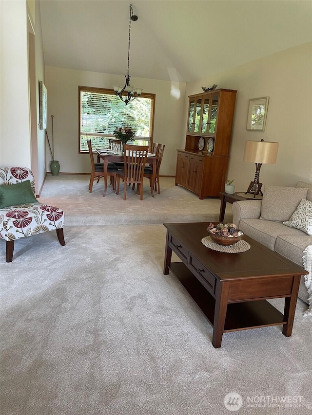 1017 Kelley Ridge Ct, Bellingham, WA 98229 - living area featuring vaulted ceiling, light colored carpet, and a chandelier