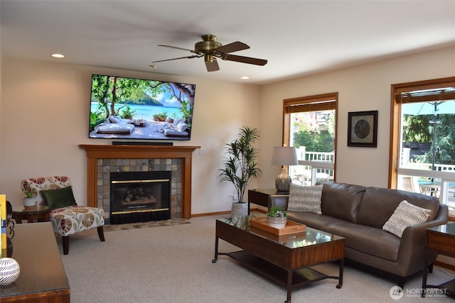 1017 Kelley Ridge Ct, Bellingham, WA 98229 - living area featuring a tile fireplace, ceiling fan, recessed lighting, and carpet flooring
