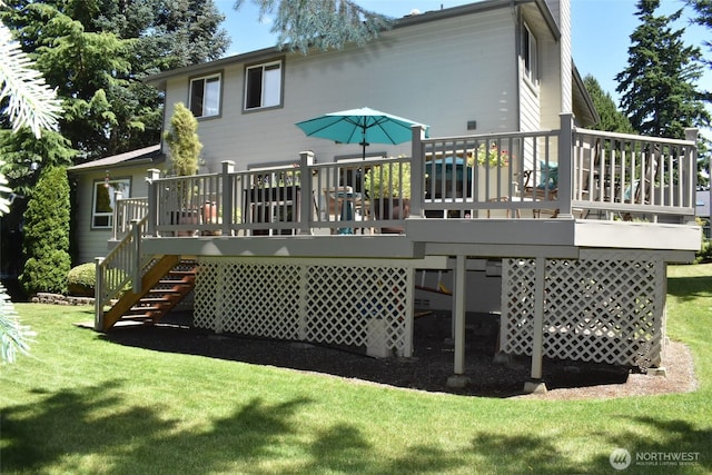1017 Kelley Ridge Ct, Bellingham, WA 98229 - back of property with stairway, a wooden deck, and a lawn