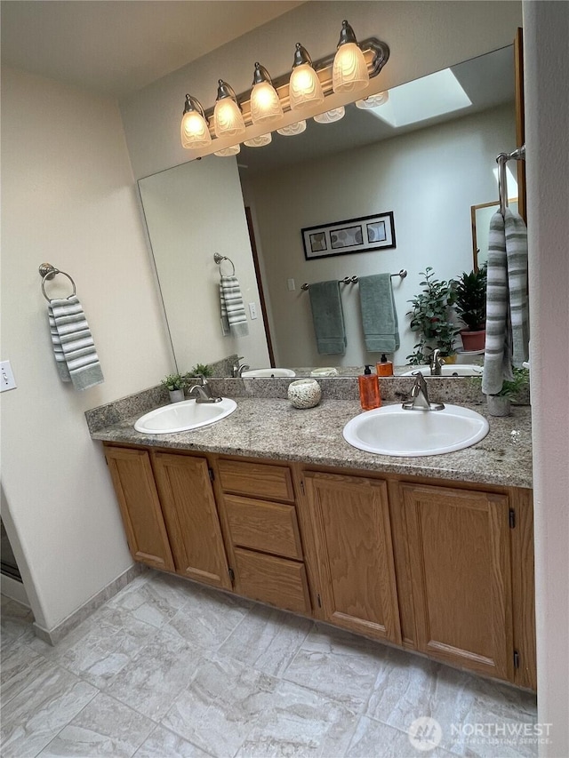 1017 Kelley Ridge Ct, Bellingham, WA 98229 - bathroom featuring double vanity and a skylight
