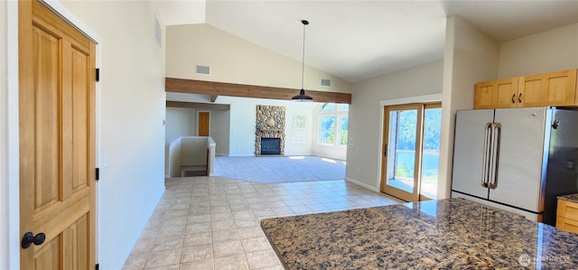 1936 Summit Lake Shore Rd NW, Olympia, WA 98502 - kitchen with freestanding refrigerator, a fireplace, light brown cabinetry, pendant lighting, and light colored carpet