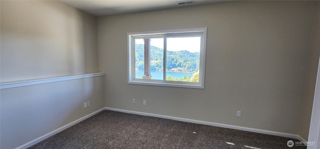 1936 Summit Lake Shore Rd NW, Olympia, WA 98502 - spare room featuring carpet flooring and baseboards