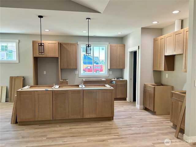 1014 Night Hawk Way, Everson, WA 98247 - kitchen featuring light wood-style flooring, a center island, hanging light fixtures, and recessed lighting
