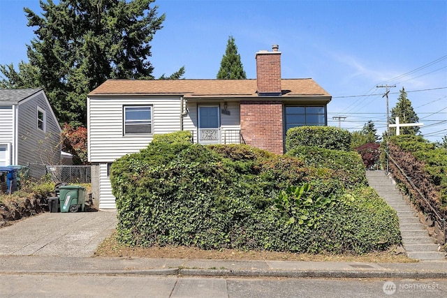 8403 36th Ave SW, Seattle, WA 98126 - view of front of home with stairway and a chimney