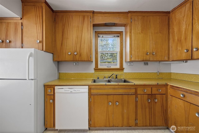 8403 36th Ave SW, Seattle, WA 98126 - kitchen with white appliances, light countertops, and brown cabinetry