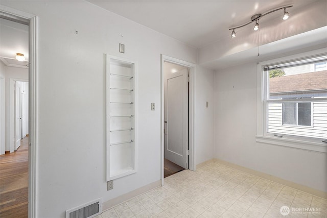 8403 36th Ave SW, Seattle, WA 98126 - unfurnished room with baseboards