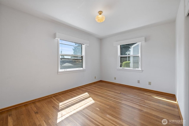 8403 36th Ave SW, Seattle, WA 98126 - spare room featuring plenty of natural light and light wood-type flooring