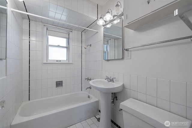 8403 36th Ave SW, Seattle, WA 98126 - bathroom with tile walls,  shower combination, and tile patterned flooring