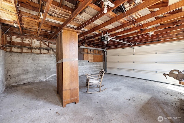 8403 36th Ave SW, Seattle, WA 98126 - garage featuring a garage door opener
