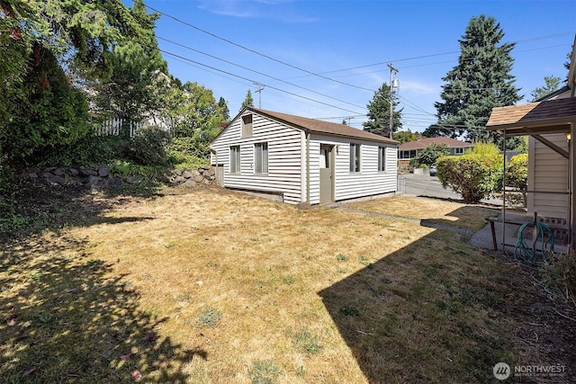 8403 36th Ave SW, Seattle, WA 98126 - view of green lawn featuring an outdoor structure