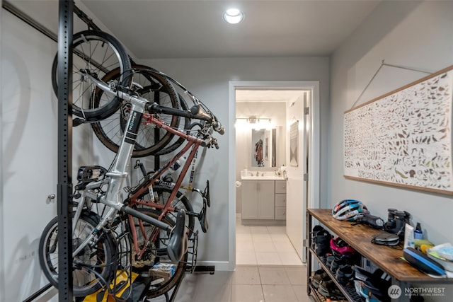 321 10th Ave S Unit 618, Seattle, WA 98104 - workout area featuring tile patterned flooring and baseboards