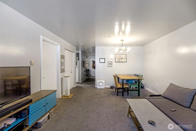 321 10th Ave S Unit 618, Seattle, WA 98104 - living room featuring a chandelier and dark colored carpet