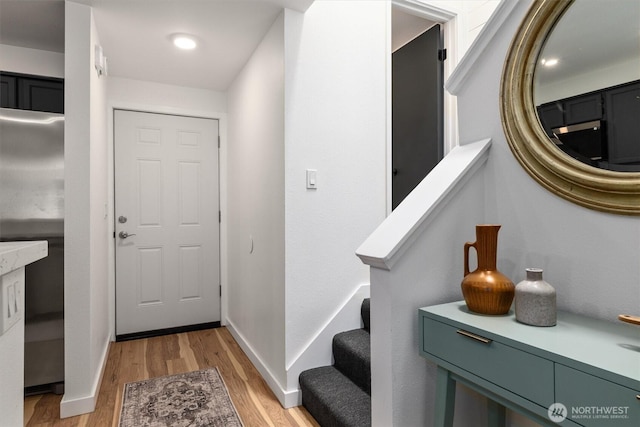 9641 NE 121st Ln, Kirkland, WA 98034 - foyer entrance featuring light wood finished floors and stairs