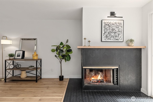 9641 NE 121st Ln, Kirkland, WA 98034 - detailed view of wood finished floors and a fireplace with flush hearth