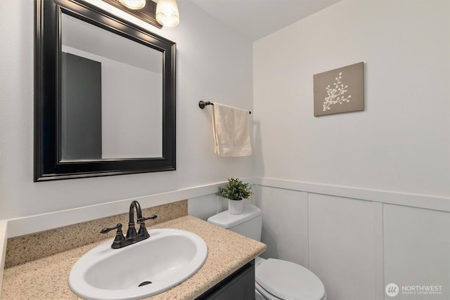 9641 NE 121st Ln, Kirkland, WA 98034 - half bath with vanity and a wainscoted wall