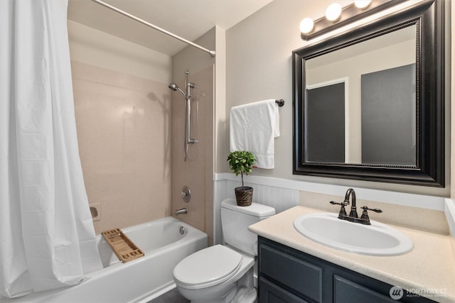 9641 NE 121st Ln, Kirkland, WA 98034 - bathroom featuring shower / tub combo with curtain, a wainscoted wall, and vanity