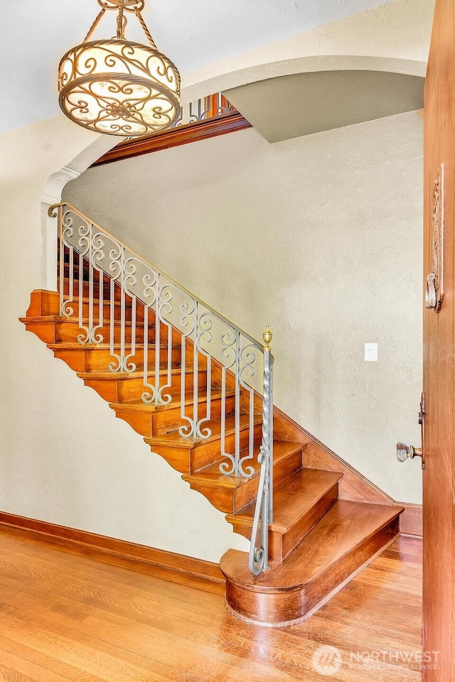 19453 Military Rd S, Seatac, WA 98188 - stairway with wood finished floors and baseboards
