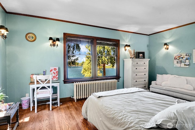 19453 Military Rd S, Seatac, WA 98188 - bedroom with radiator heating unit, wood finished floors, and crown molding