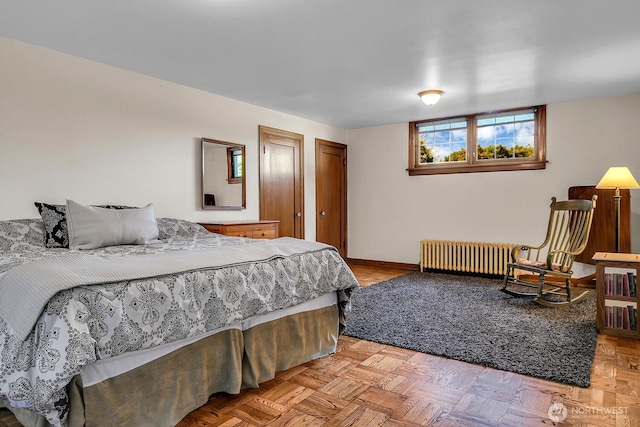 19453 Military Rd S, Seatac, WA 98188 - bedroom featuring radiator heating unit and baseboards