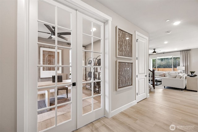 18019 139th Pl E Unit 19, Puyallup, WA 98374 - corridor featuring french doors, wood finished floors, and recessed lighting
