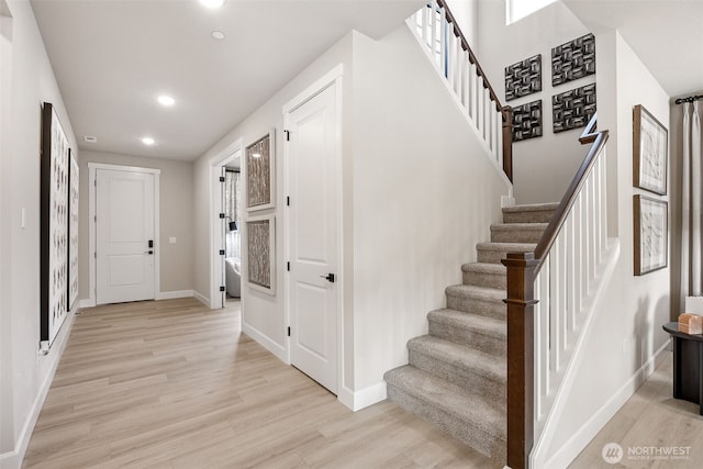 18019 139th Pl E Unit 19, Puyallup, WA 98374 - foyer entrance with recessed lighting, light wood-style floors, and stairway
