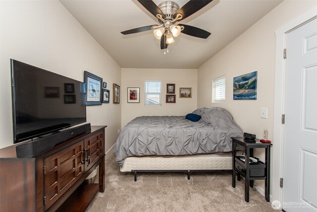 70 Onyx Ln, Sequim, WA 98382 - carpeted bedroom featuring ceiling fan and baseboards